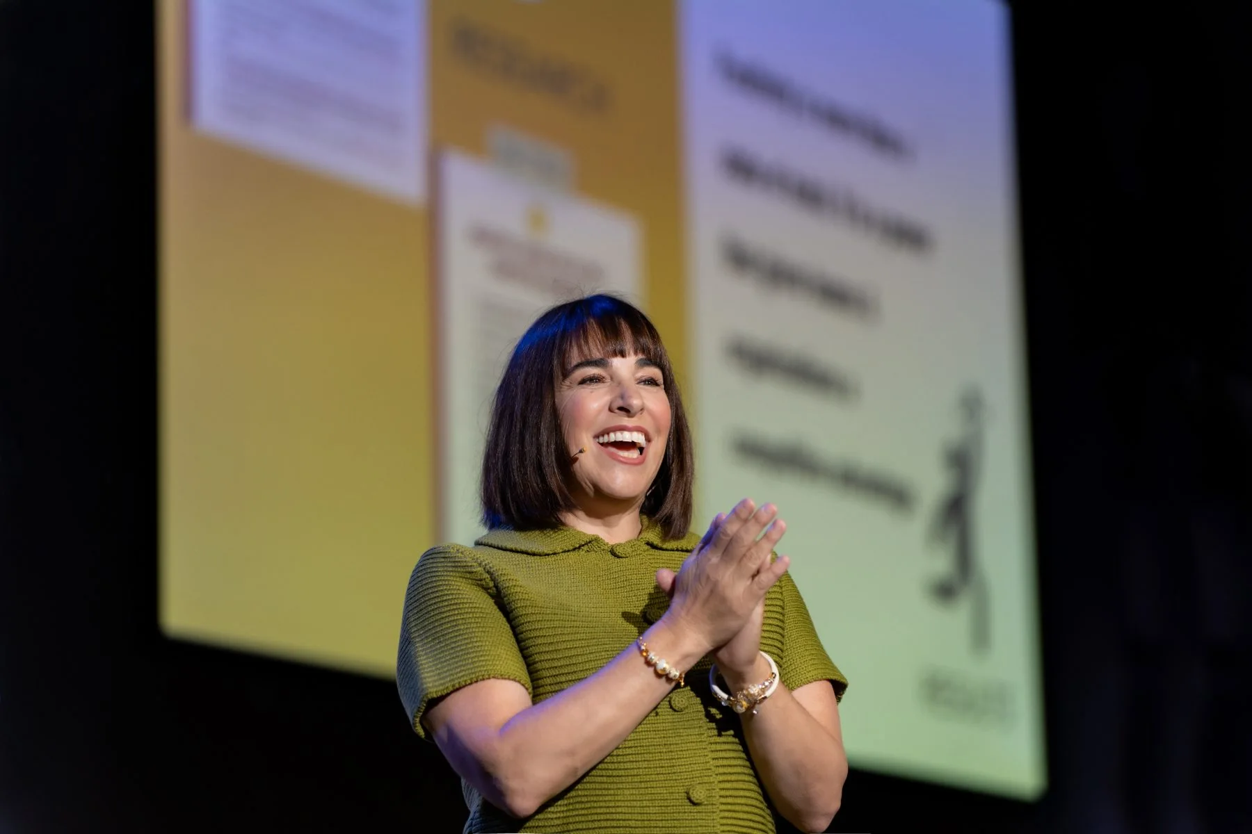 Rachel Williamson speaking on stage at WITcon 2025